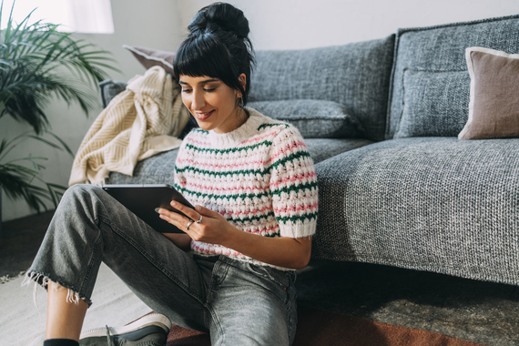 Woman viewing tablet
