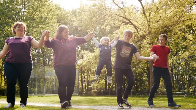 Group of people walking in park