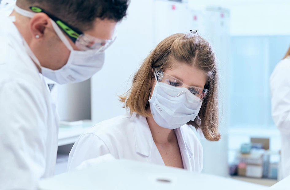 A pair of doctors looking at something