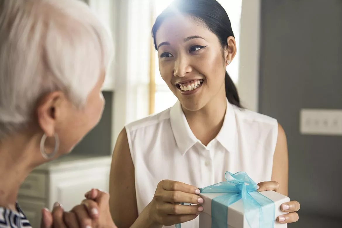 Woman presenting a gift