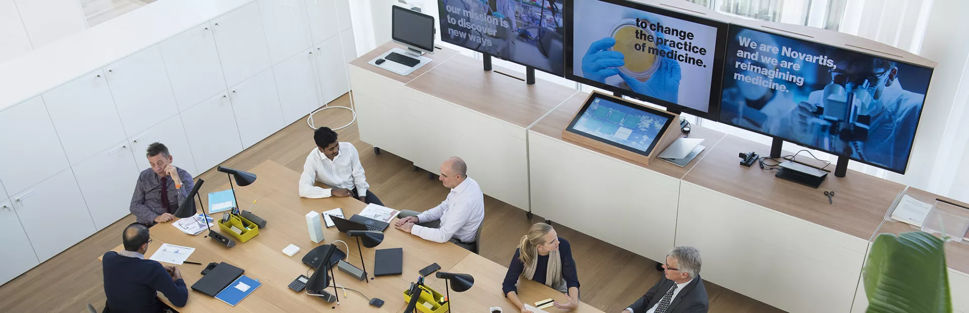 A photo of people in a meeting hall