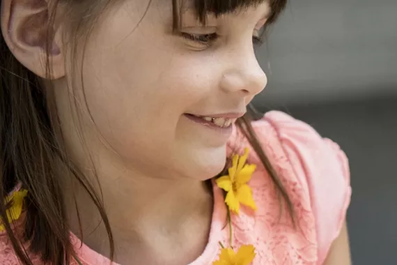 A girl with a flower