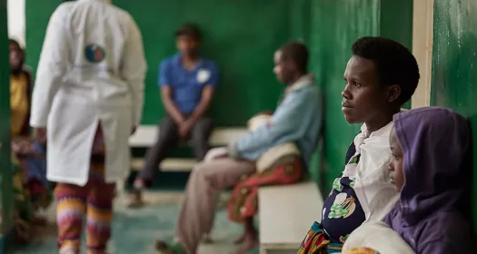 Young patients waiting outside hospital in Rwanda