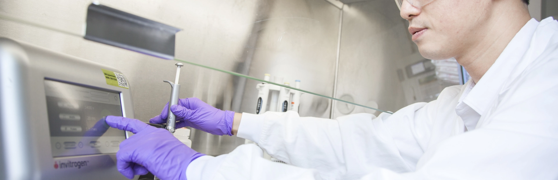 Image of scientist working in a lab