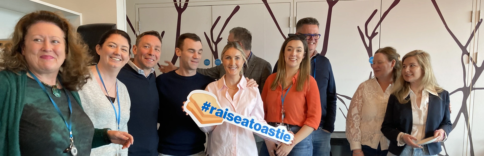 Image of Novartis staff raising a toastie to support rare disease day