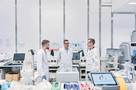 Scientists discussing at the lab