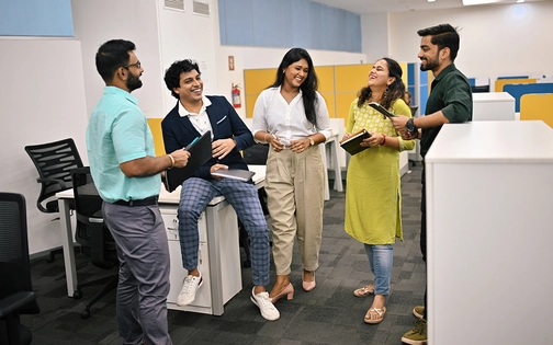 A group of associates having fun at work