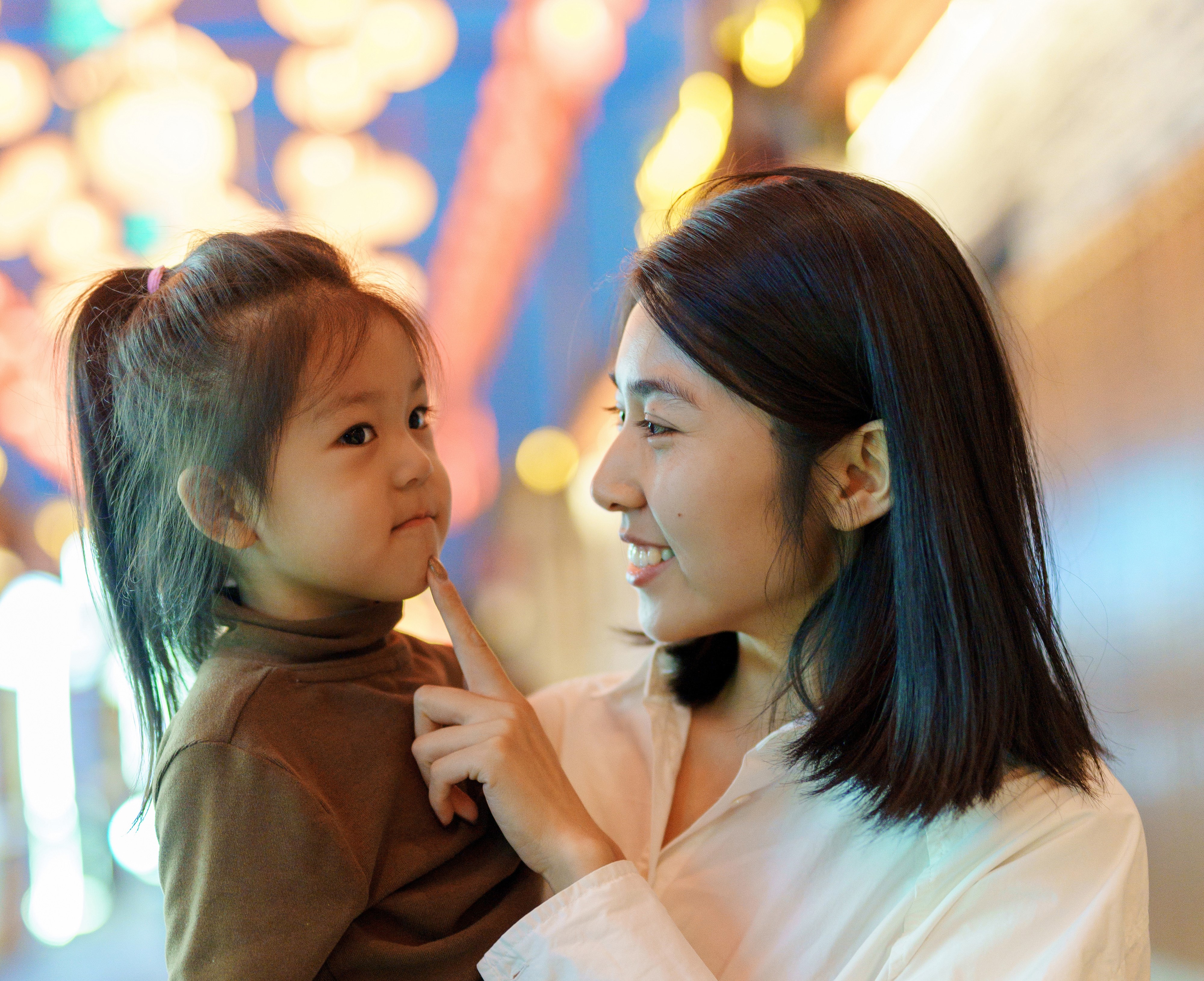 Parent and child enjoying a night out-1