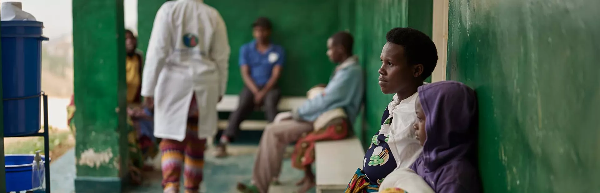 Young patients waiting outside hospital in Rwanda