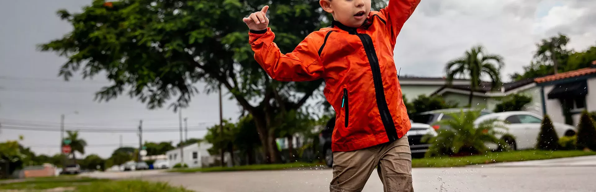 boy-playing-puddle-flip