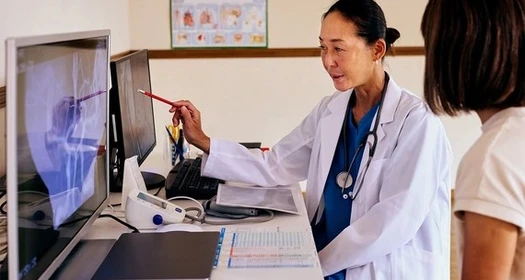 doctor-explaining-a-scan-to-their-patient-media-content