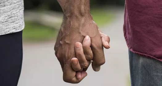 A couple holding hands