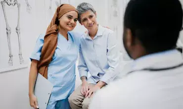 nurse-patient-exchanging-warm-moment-card.jpg