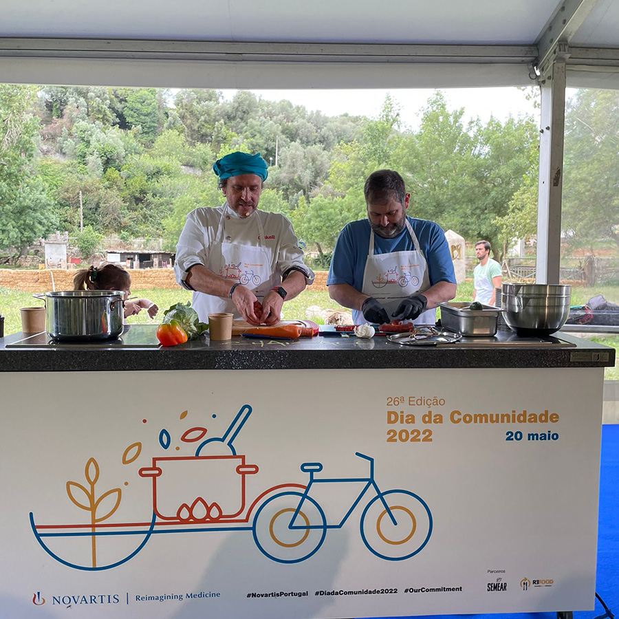 Chef and volunteer cooking