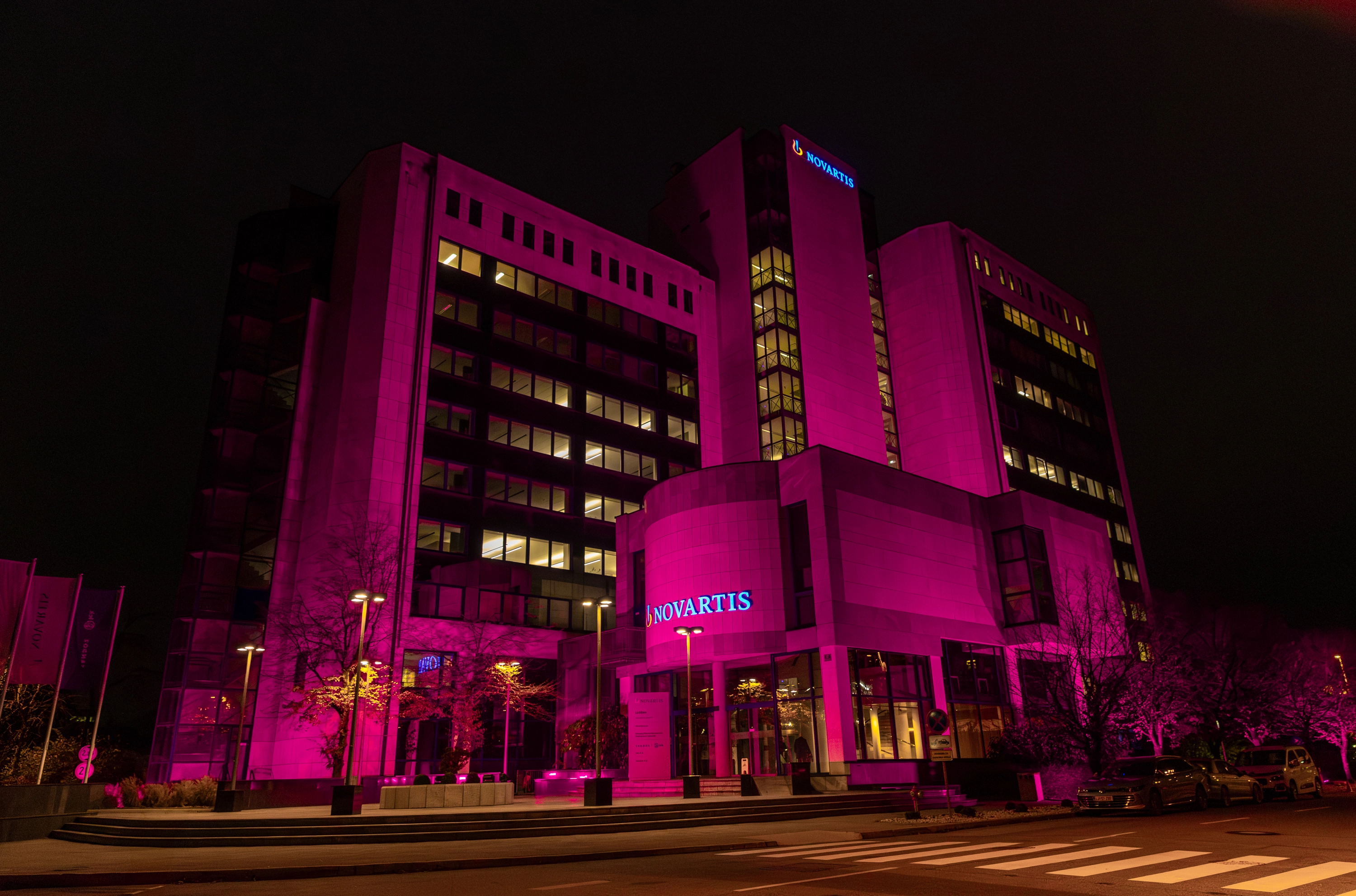 Business building in Ljubljana symbolically illuminated in purple