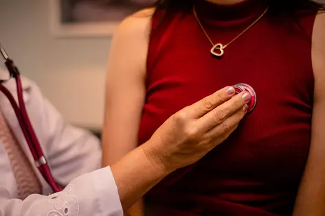 Doctor using a stethoscope