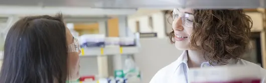 Two researchers in lab.