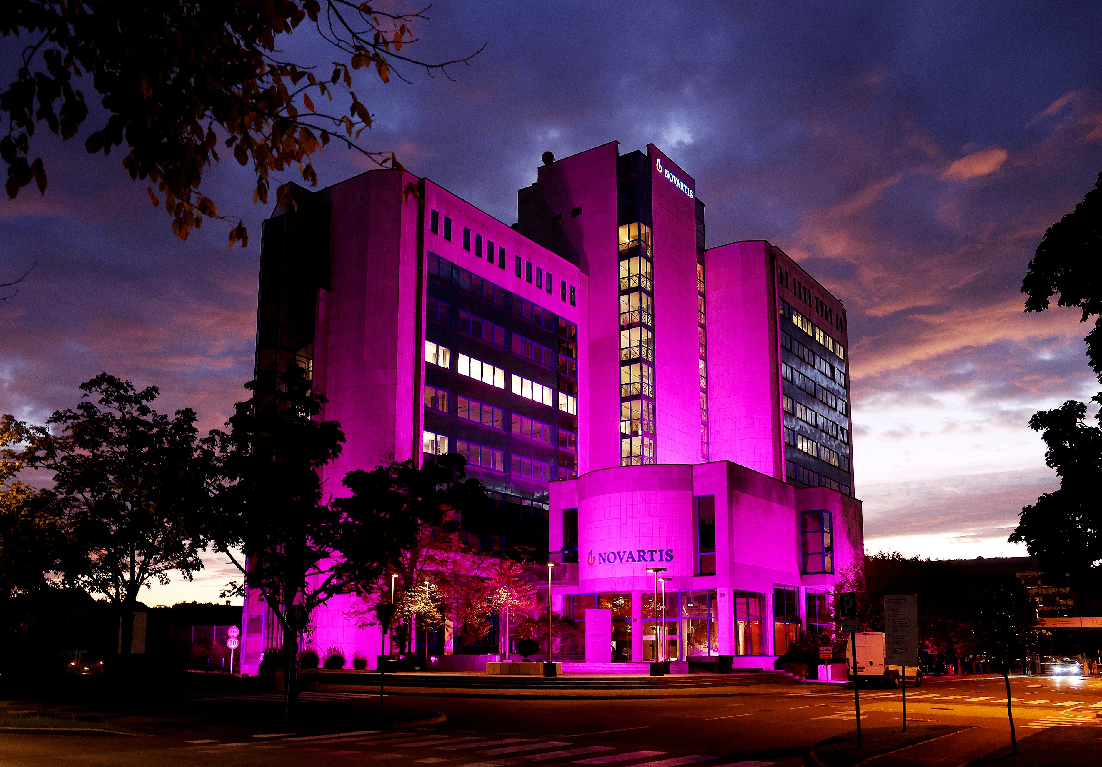 Pink October – illuminated Novartis building