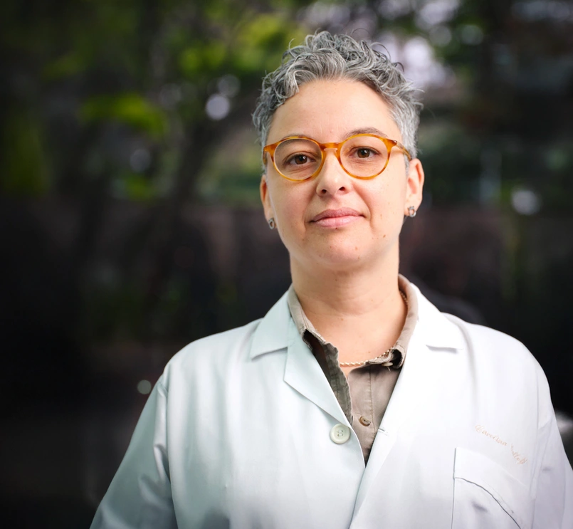 HCP wearing glasses looking at the camera