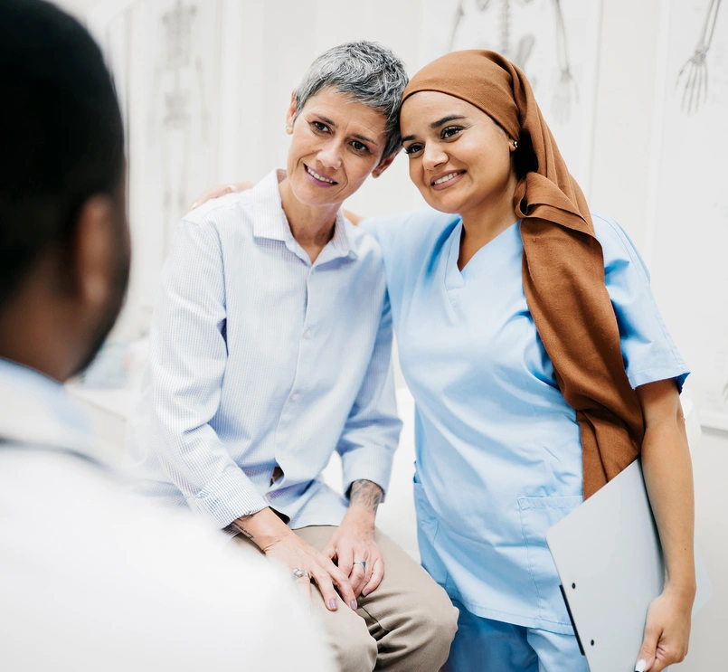 Nurse and patient exchanging a warm moment