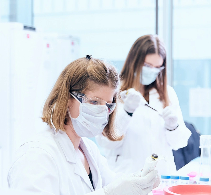 Two scientists working in a modern lab