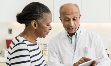 A patient asking a doctor about a clinical trial