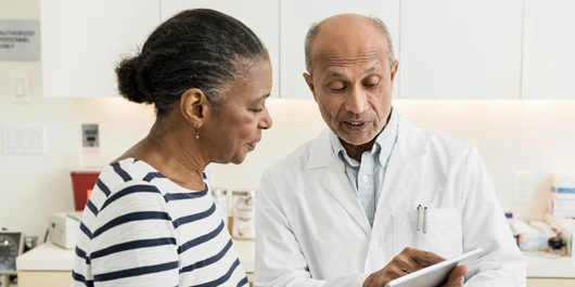 A patient asking a doctor about a clinical trial
