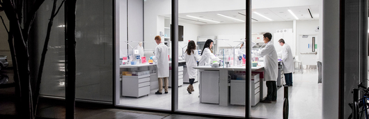 Scientists working in a lab at night
