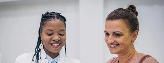 Doctor and patient discussing medical results on an iPad