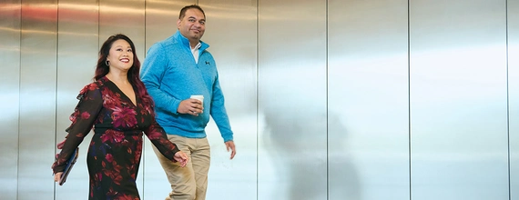 Two people are walking together