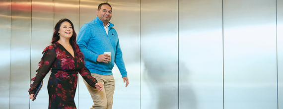 Two people are walking together