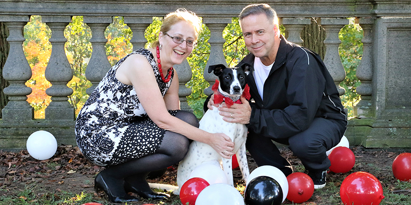 Alexandra Bach-Weidmuller and her husband caring for a dog