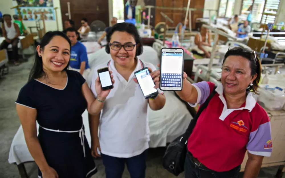 Women in Philippine hospital use mobile phones for leprosy updates