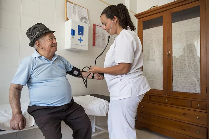 A patient gets a checkup for his diabetes 