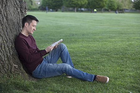 Kidney disease patient rests in a park