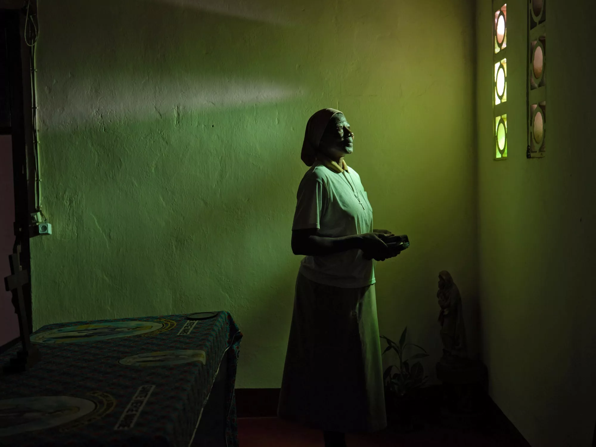 Sister Martine in a prayer room at the mission, where she has spent most of her life.