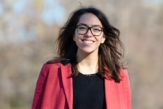 A portrait of Raundi, a Principal Scientist Oncology at Novartis