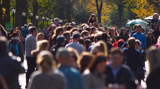 Crowd walking outdoors