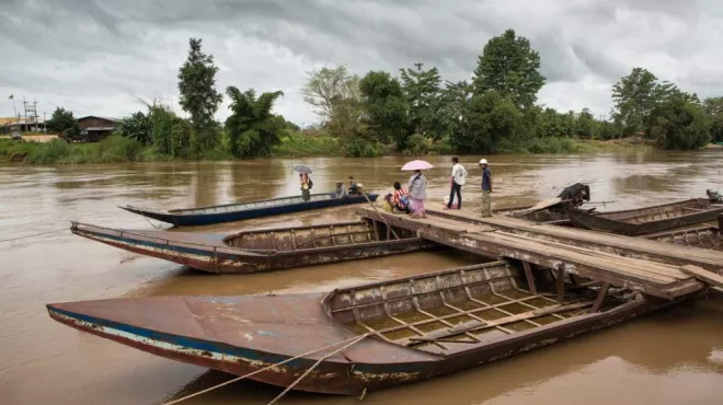 Boats on a river on border between Thailand and Burma, where resistance to artemisinin has been detected.