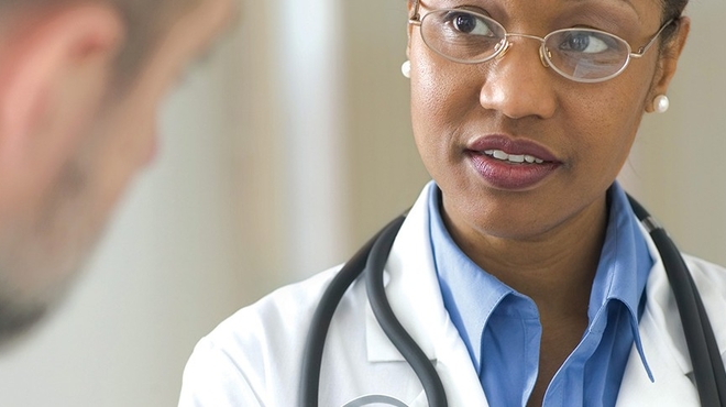 Doctor talking to patient Doctor talking to patient