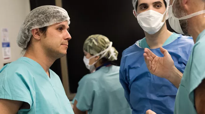 Transplant surgeon in Argentina confers with colleagues