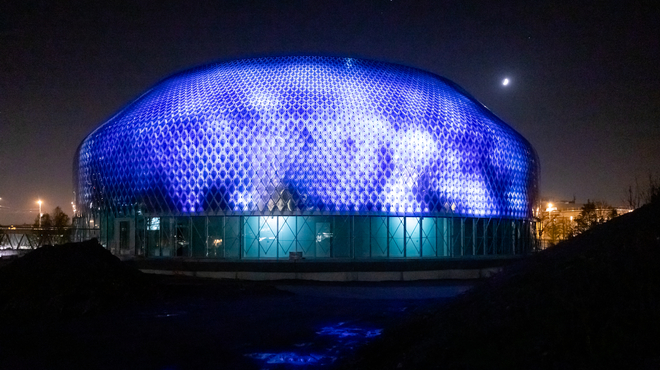 Illumination of zero-energy media facade of the Novartis Pavillon.