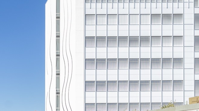 Close up of the Novartis logo on the Banting 1 building, Novartis Campus Basel (vertical)