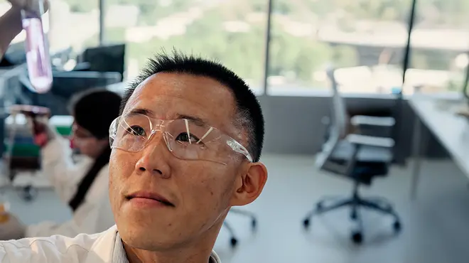 Scientist looking at a test tube with liquid as he holds it in a Novartis lab. Across R&D, our scientists are pushing the boundaries of science to discover and develop breakthrough medicines, moving from molecule to patient with urgency to help people live better, not just longer. Scientist looking at a test tube with liquid as he holds it in a Novartis lab. Across R&D, our scientists are pushing the boundaries of science to discover and develop breakthrough medicines, moving from molecule to patient with urgency to help people live better, not just longer.