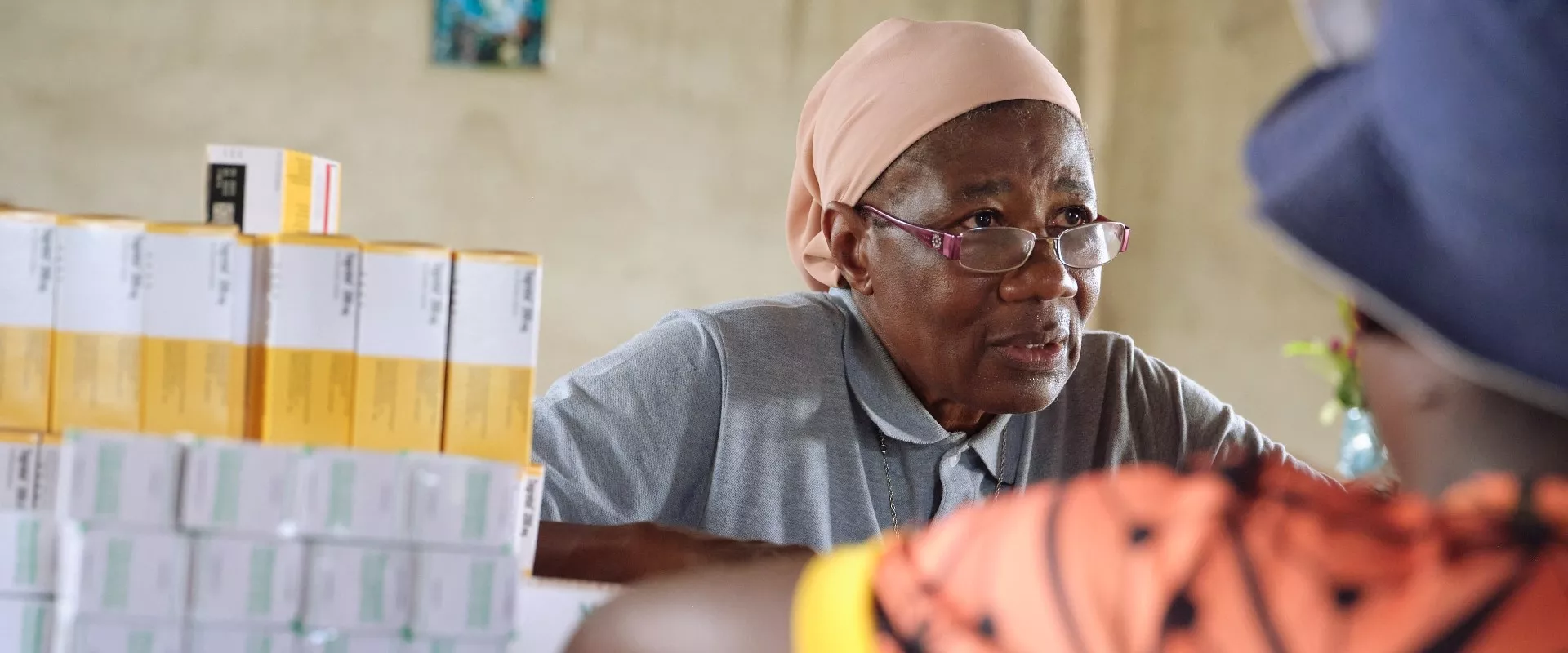 Sister Martine, a trained nurse, dispensing medicine at the Catholic mission’s health center in Ntui, Cameroon.