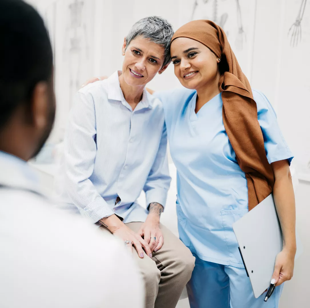 Nurse and patient exchanging a warm moment