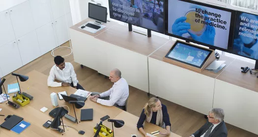 A photo of people in a meeting hall