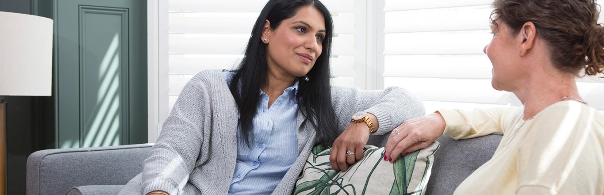 Two women discussing