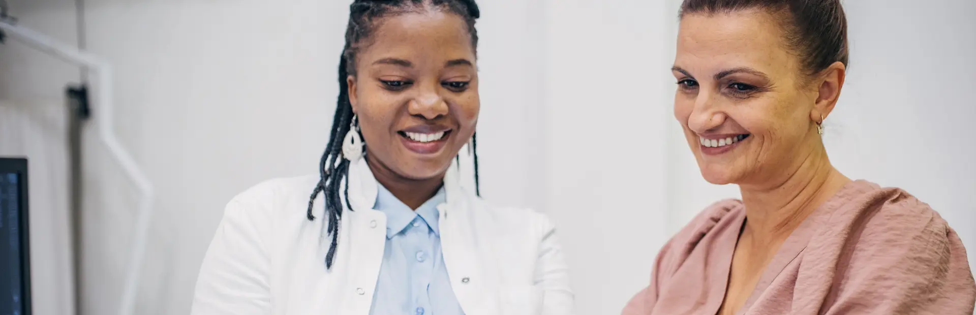 Doctor and patient interacting on medical results