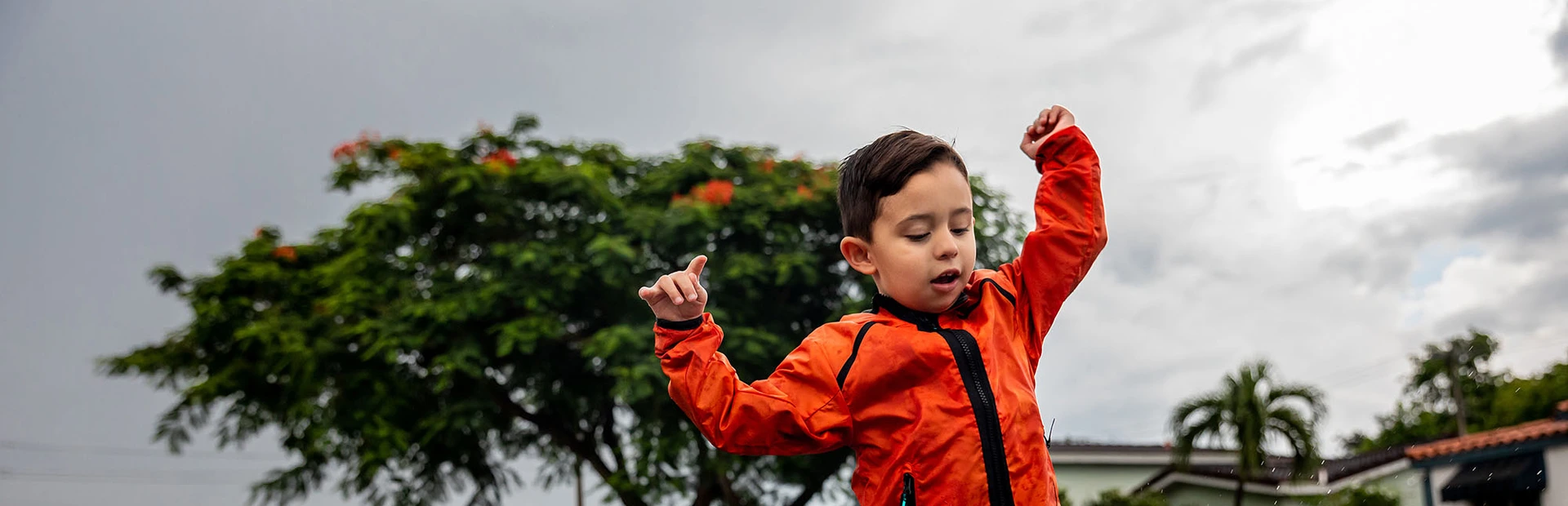 boy playing puddle flip